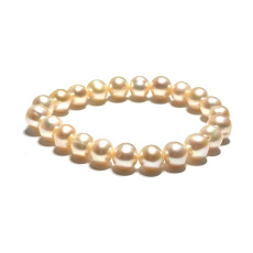 Pearl apricot elastic bracelet natural, bead 9 mm / 16 - 17 cm, symbol of femininity, brings admiration