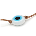 Blue eye bracelet rope woven brown, gold color ball