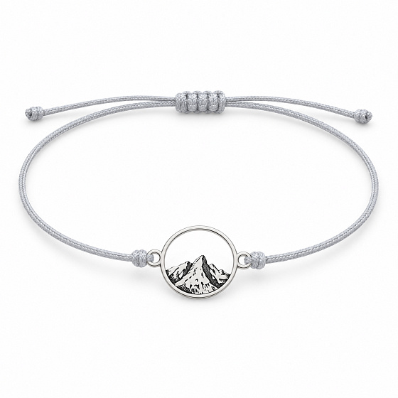 The Power of Color – The Mountains Are Calling – mountain-themed bracelet on a light gray cord
