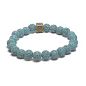 Lava light blue with royal mantra Om, bracelet elastic natural stone, ball 8 mm / 16-17 cm, born of the four elements