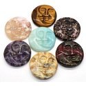 Rhodonite face of the sun and moon hand carved natural stone 5 cm, stone of forgiveness