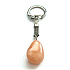 Calcite Trommel pendant keychain natural stone, approx. 10 cm